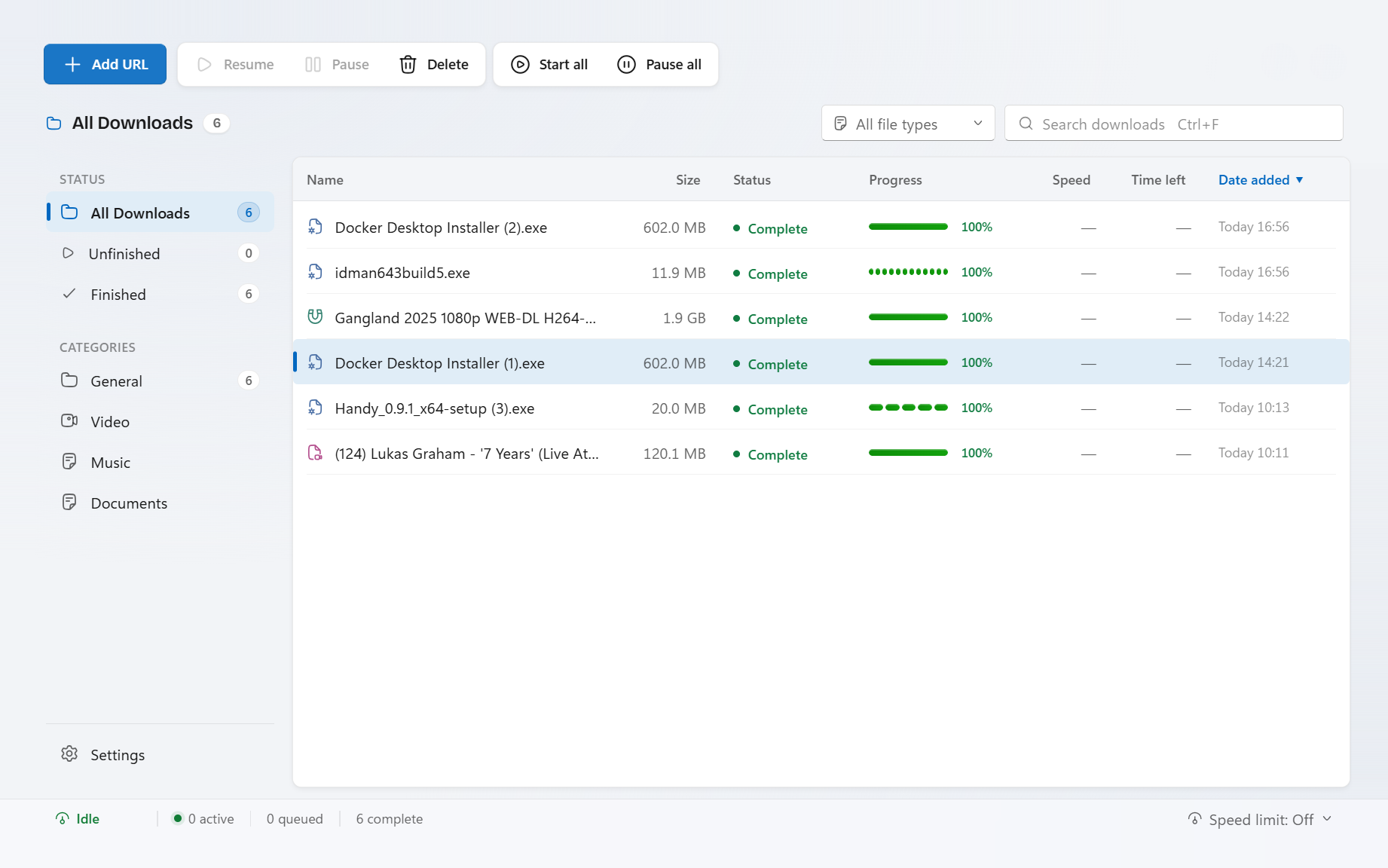 The Grabify app on Windows — a clean download list with progress, categories and speeds.